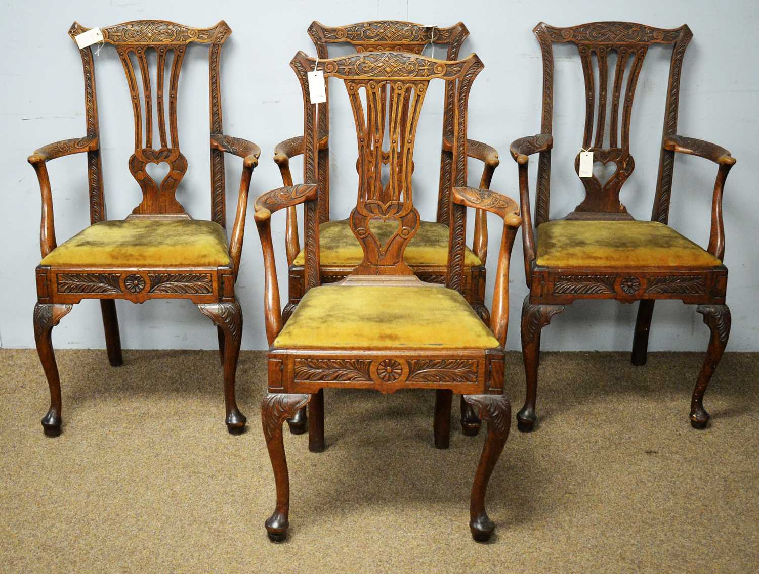 A set of four late 19th Century oak carver chairs