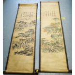 A pair of Chinese scroll paintings.