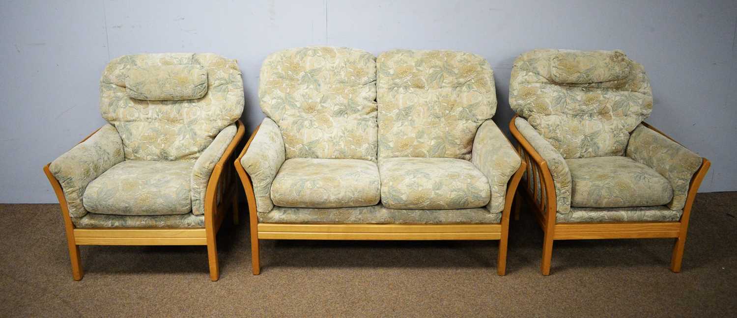 An Ercol three-piece suite