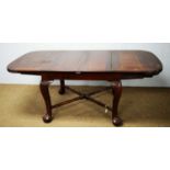 20th C mahogany extending dining table.