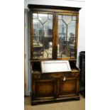 An Early 20th Century oak bureau bookcase