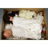 An Armand Marseille bisque headed doll and other dolls.