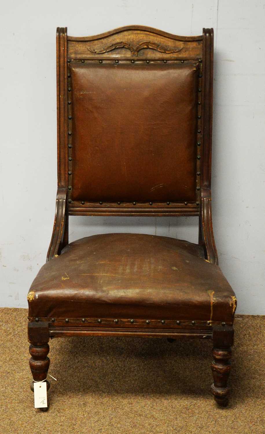 A late Victorian beech easy armchair