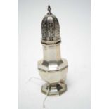 A silver sugar caster