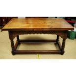An early 20th Century oak drawers leaf trestle table