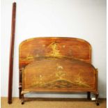 A late 19th Century/early 20th Century rosewood and japanned bed
