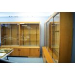 Two 20th Century oak glazed display cabinets.