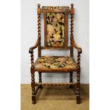 A late Victorian 17th Century style high backed armchair
