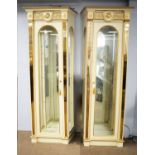 A pair of Italian cream painted display cabinets