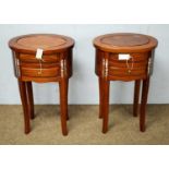 A pair of French style oval bedside tables