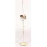 A mid-20th Century white plastic and metal floor lamp