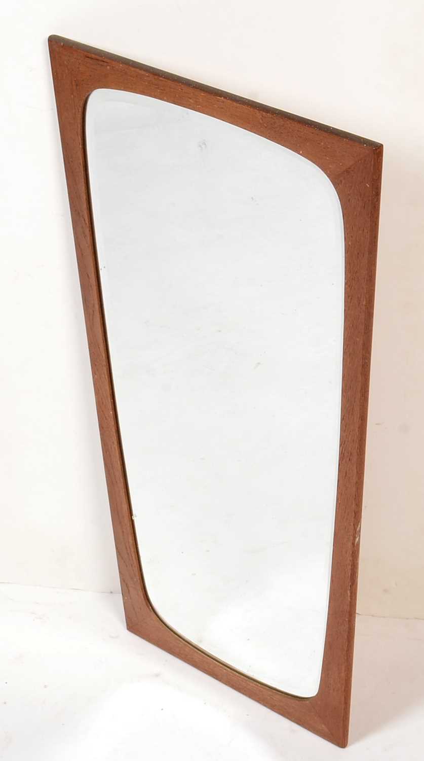 A Danish teak framed mirror.