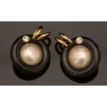 Chanel: a pair of faux mabe-pearl, black plastic and gilt metal earrings