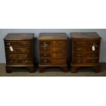 Three 20th C George III style mahogany bedside cabinets.