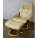 20th C Ekornes Stressless reclining armchair and footstool.