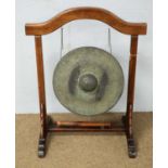 19th C gong on later oak stand.