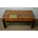 20th C oak and brass-bound coffee table.