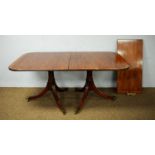 20th Century Regency style mahogany pedestal dining table.