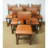 Set of six early 20th C leather upholstered dining chairs.