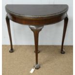 Early 20th C mahogany demi lune card table.