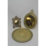 Two mirrors and a brass tray