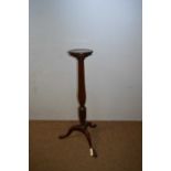 20th C mahogany torchere.