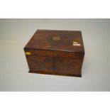An early 20th Century walnut sewing box