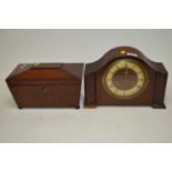 A Victorian mahogany tea caddy and a mantel clock