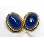 A pair of blue stone cabochon ear-clips/earrings.