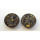 Two Meiji Japanese shakudo and shibuichi shirt studs.