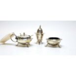 An Edwardian silver three-piece condiment set.