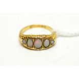 An antique 18ct gold and opal dress ring.
