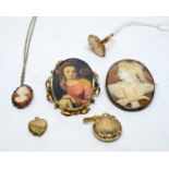Vintage jewellery including a cameo brooch and ring.