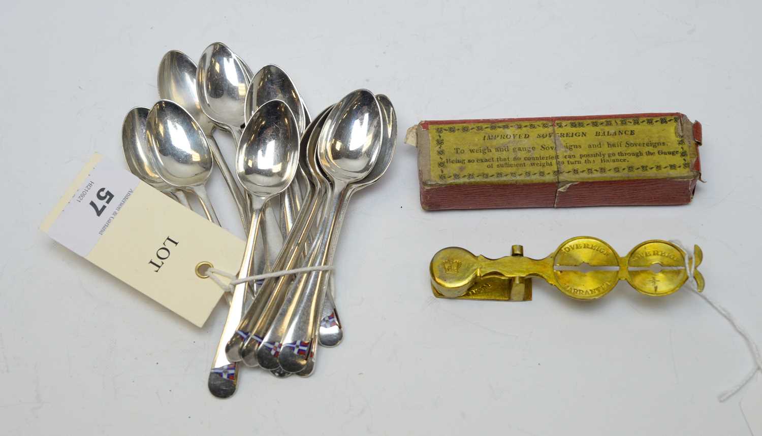 A group of fifteen silver teaspoons from the Royal Columbo Yacht Club.