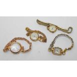 Four ladies' 9ct gold cased wristwatches