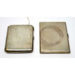 Two silver cigarette cases.