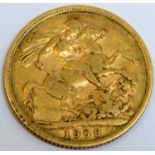 A 1909 gold sovereign.