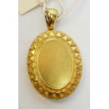 A 19th Century Etruscan Revival yellow-metal locket.