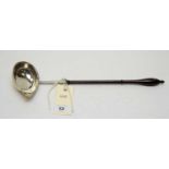 A George III silver toddy ladle.