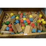 A selection of childrens stained wood building blocks