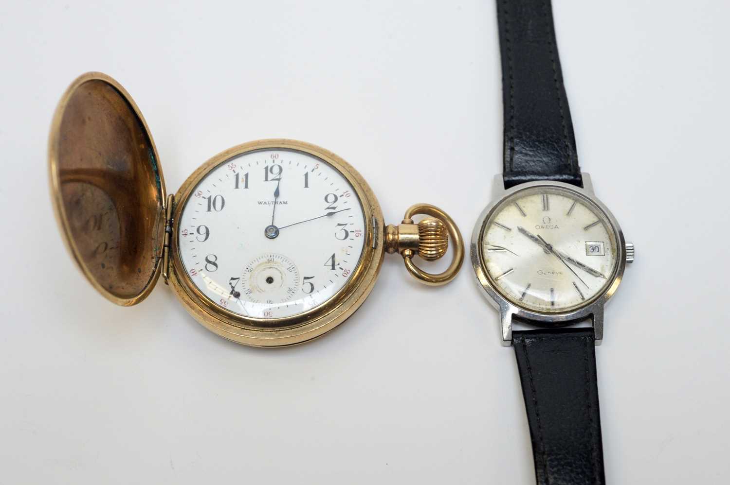 A gentleman's Omega wristwatch and Waltham hunter pocket watch.