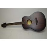 An Adam Black Guitar Company acoustic guitar 880-2T-VS