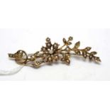 An antique yellow-metal and seed pearl brooch.
