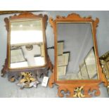 Two George II style mahogany fret carved wall mirrors