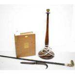 Collectors' items including The Book of Arran, a walking cane, and paper-knife.