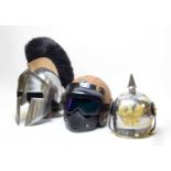 Three helmets and bugle