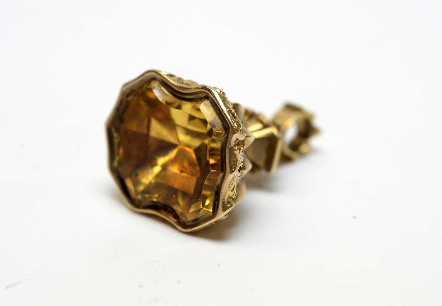 A 19th Century yellow metal and citrine fob seal.