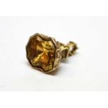 A 19th Century yellow metal and citrine fob seal.