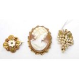 Three vintage 9ct gold brooches.
