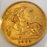 A 1909 gold half sovereign.